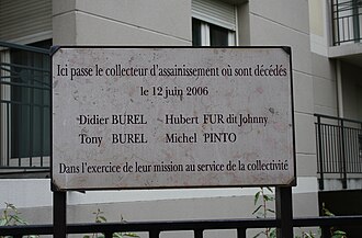 Plaque en mémoire d'ouvriers morts au travail (Poissy)