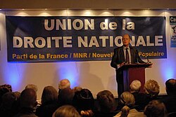 Carl Lang lors d'une réunion de l'UDN